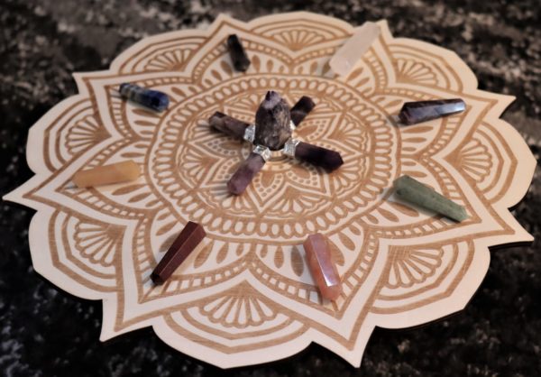 lotus flower mandala crystal grid with crystals displayed angle view